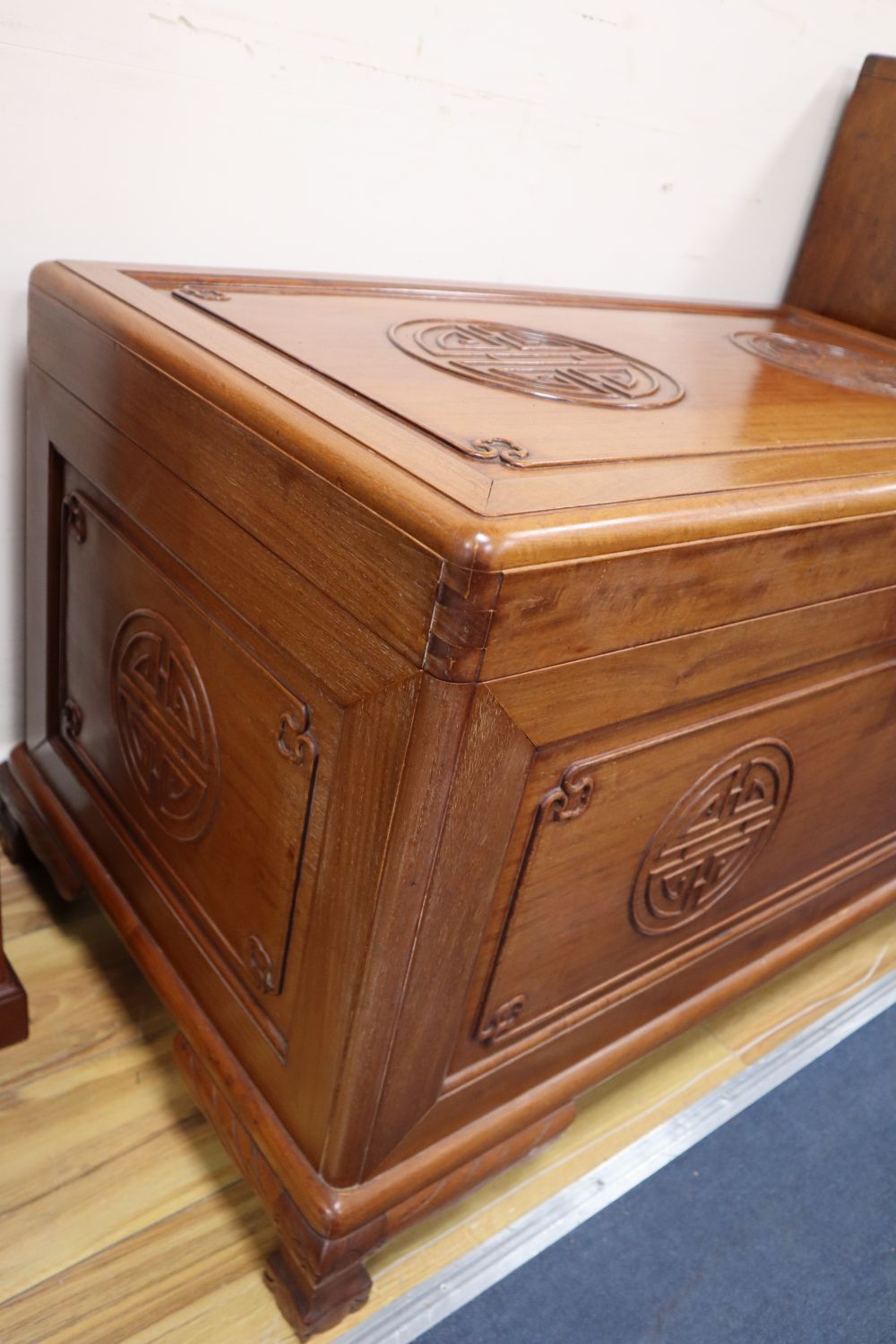 A Chinese hardwood shou medallion chest, width 101cm, depth 55cm, height 59cm